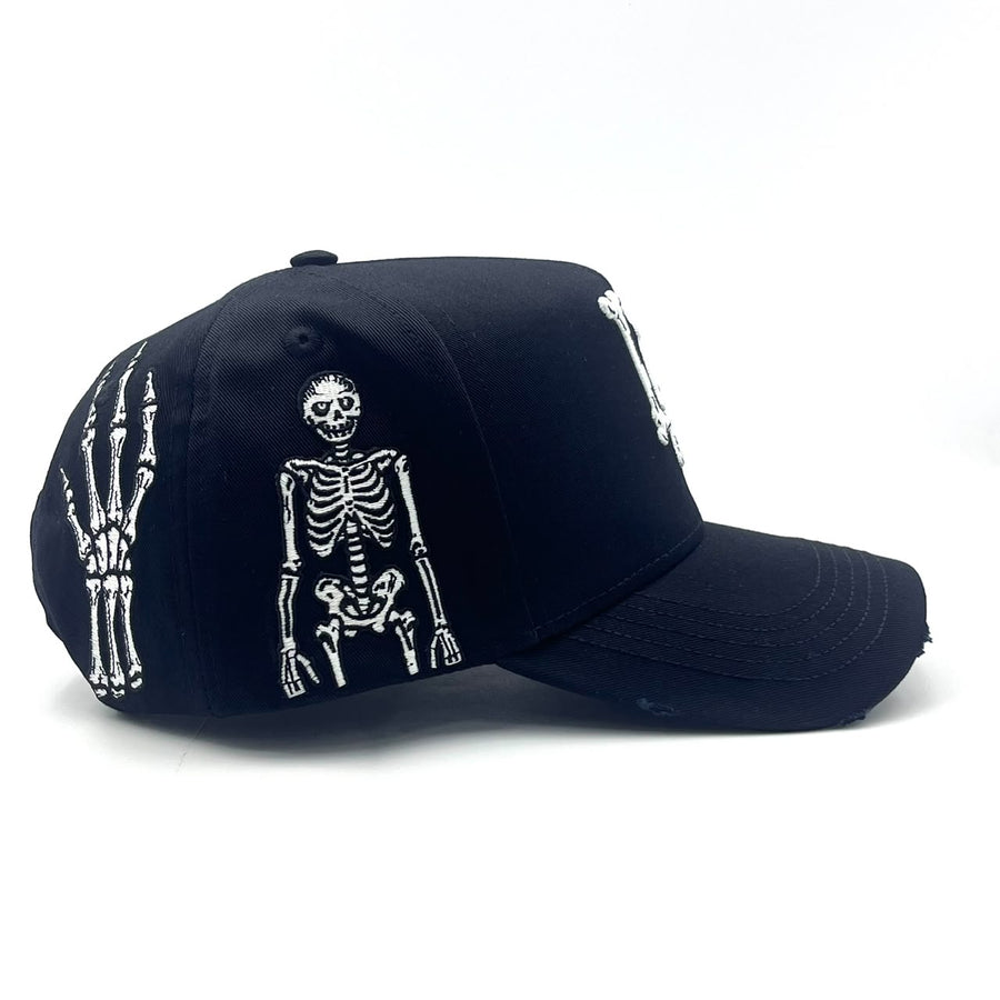 Become Again Skeleton hat, side — standing skeleton