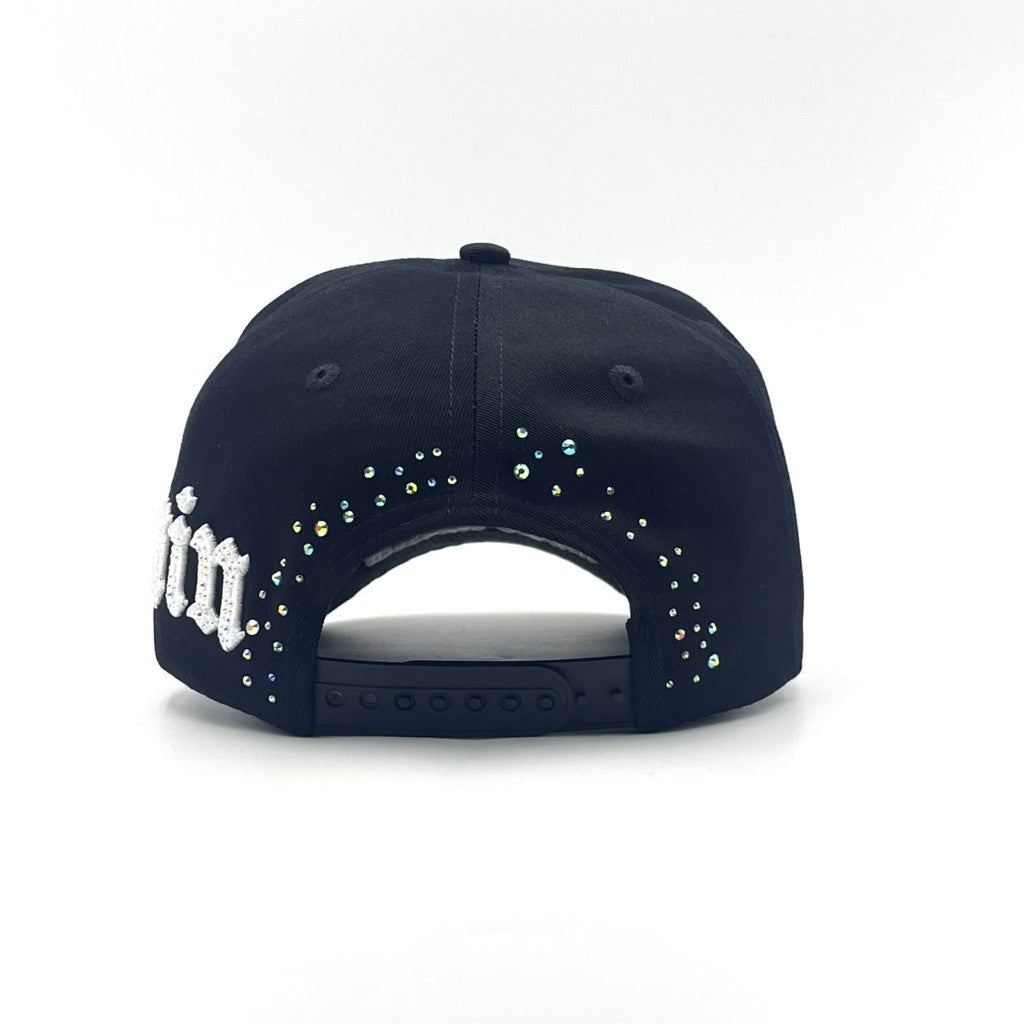 Become Again crystal hat, back — crystal scatter and snap